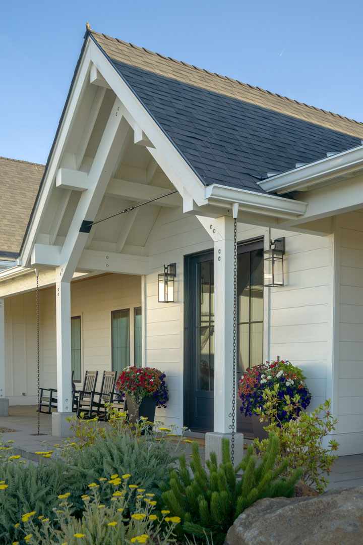 Entrance view of white farmhouse in Sister, Oregon
