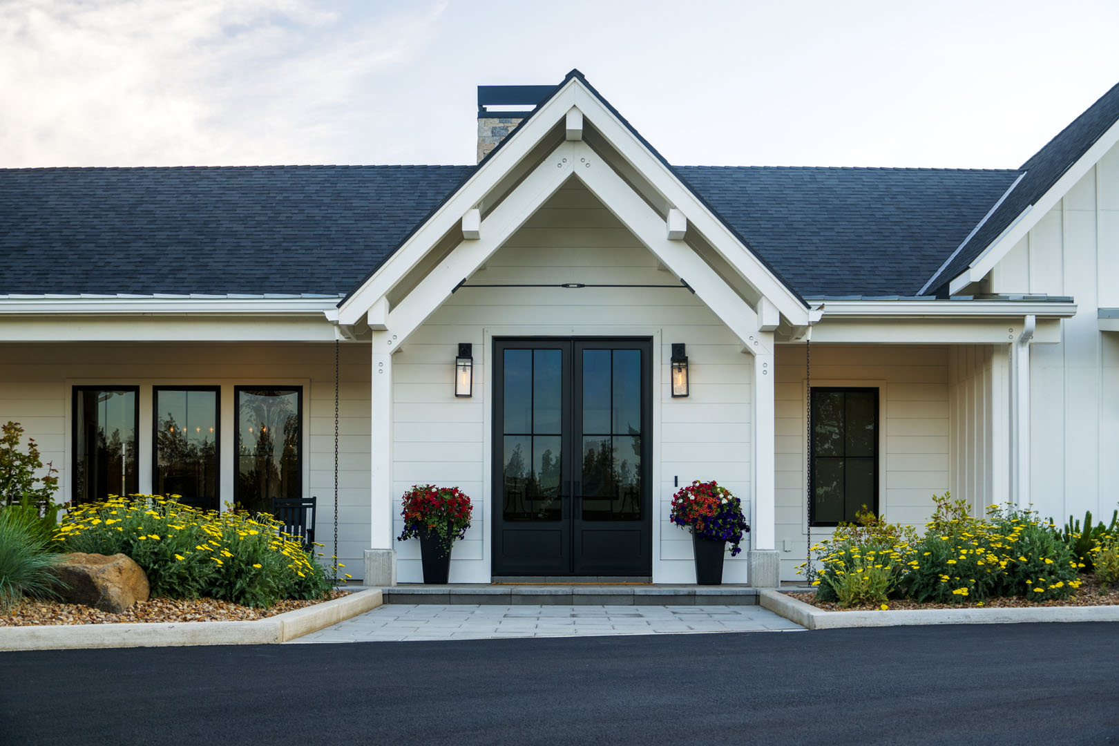 Exterior view of residential building with a green lawn