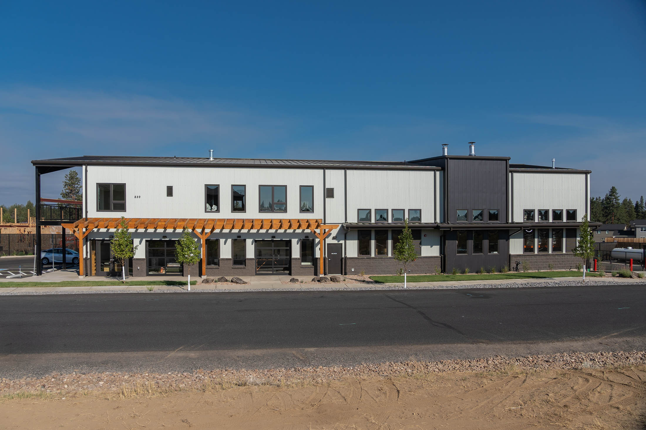 Exterior of modern commercial building designed by Bend Architects