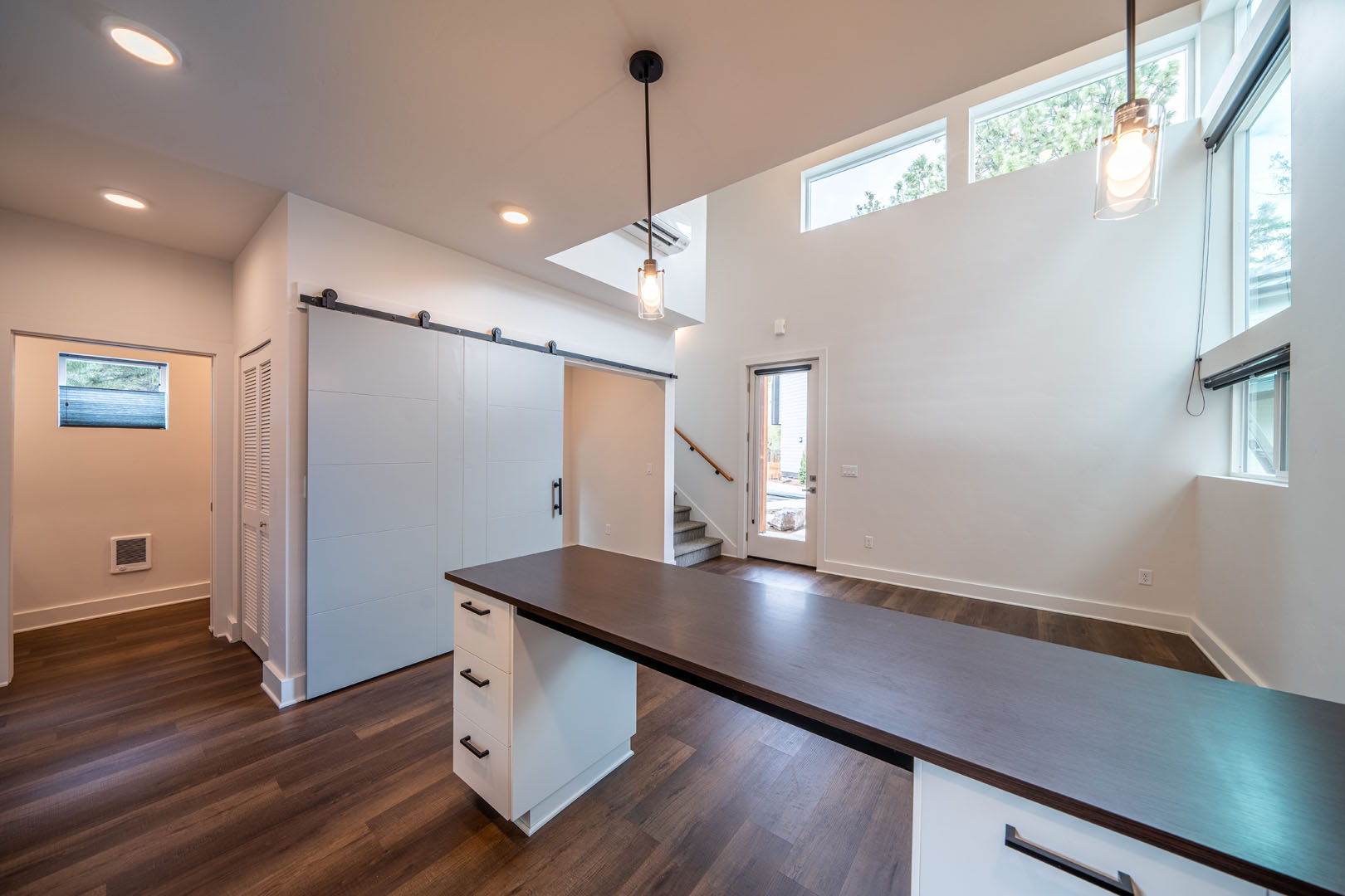 Inside view of large table in roomy kitchen and dining area