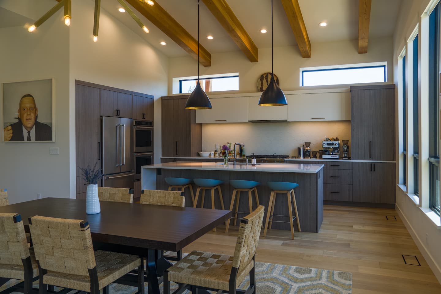 Clean and green kitchen view of beautiful residential rand style home designed by Full Circle Design in Bend, Oregon