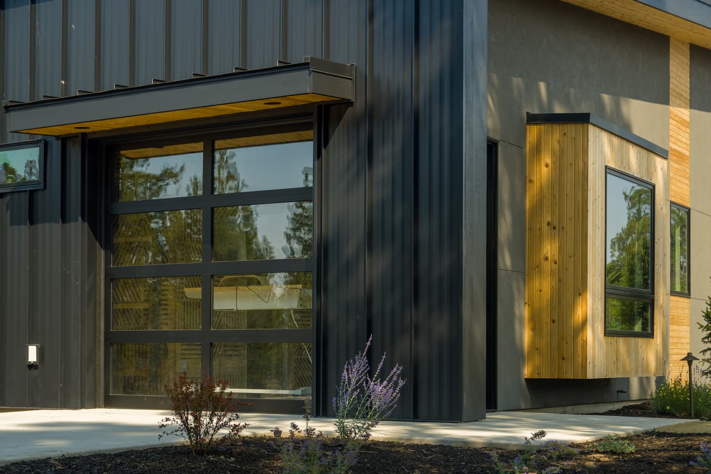 Garage doors in healthy newly designed home by Full Circle Design